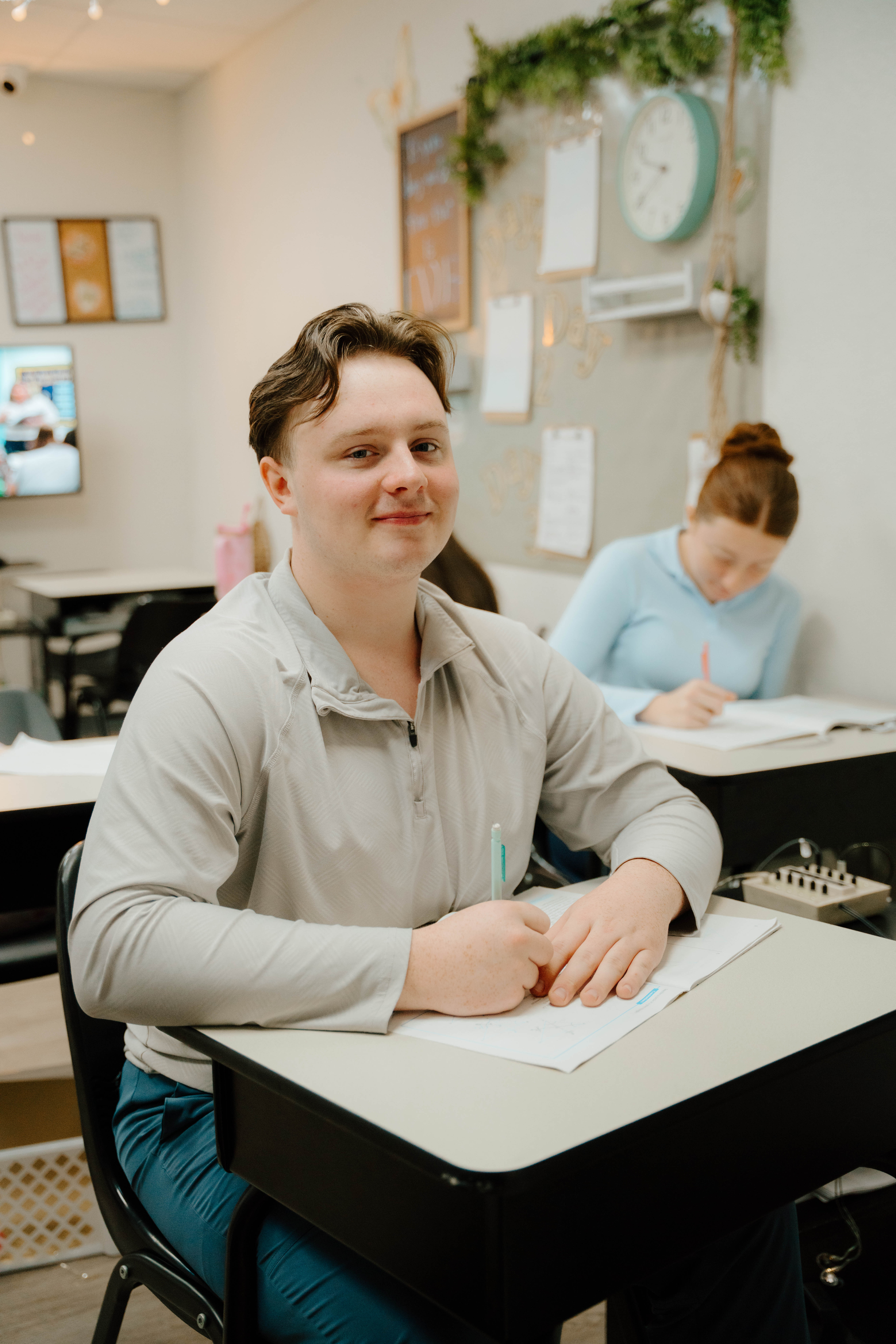 A Pine Grove Academy student learning in the classroom